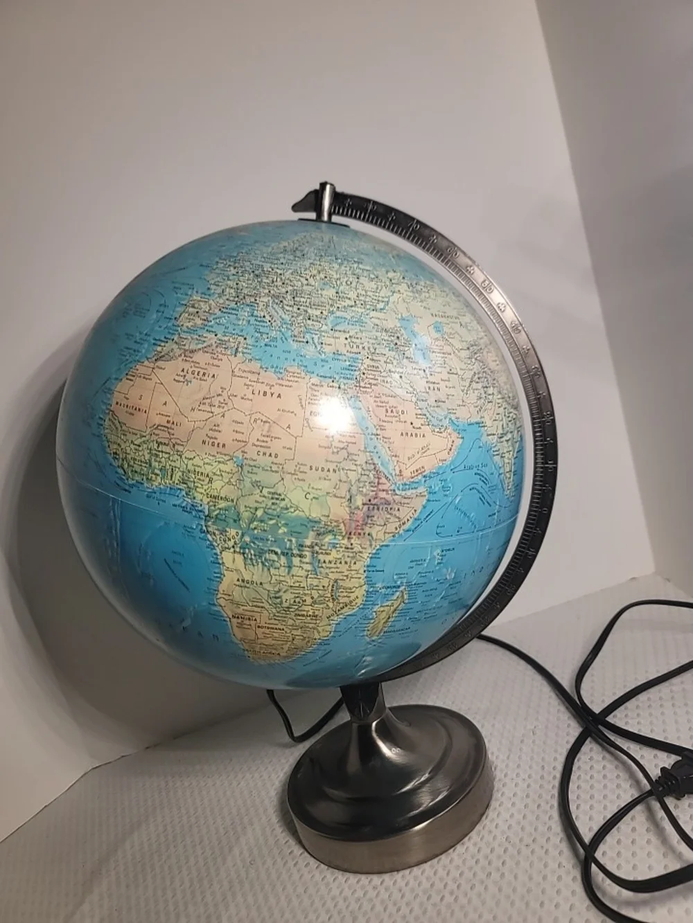 Illuminated Blue Table Globe on Metal Stand